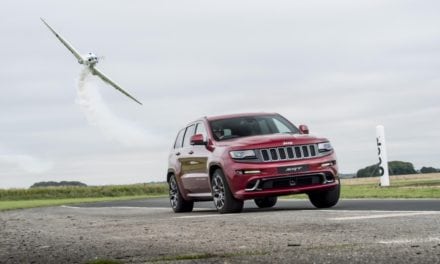 Jeep Grand Cherokee SRT races aerobatic twister plane in ultimate hot lap