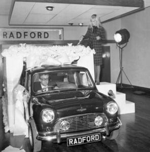 Britt Elkland Peter Sellers Radford Mini copy 296x300 - Radford Returns with Motoring Legends